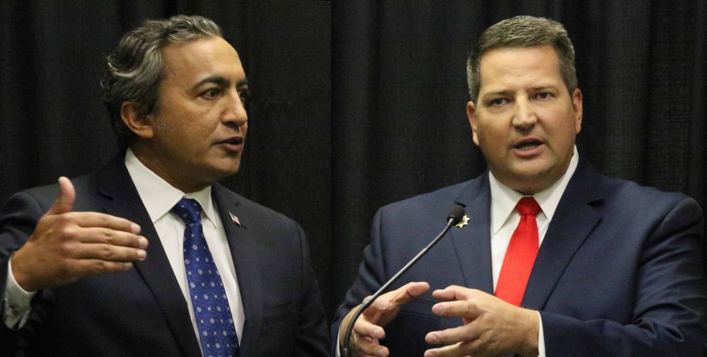 Congressman Ami Bera (left) and Sheriff Scott Jones (right) answer questions during press conferences following their 7th Congressional District debate on Tuesday. (Photo by Jordan Schauberger)