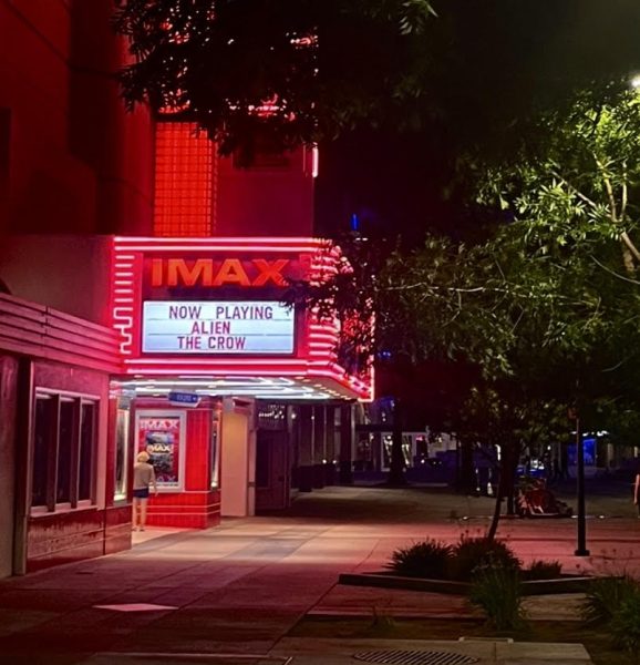 Imax Theatre in downtown Sacramento promotes new “Alien: Romulus” and “The Crow” movies with a timeless marquee (Photo by Janelle Germain). 
