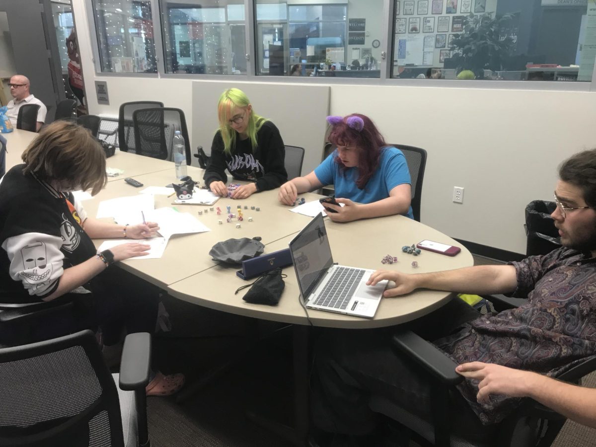 The “D&D Club” at its regular Monday afternoon meeting on Nov. 4. (photo by Elisha Chandra)