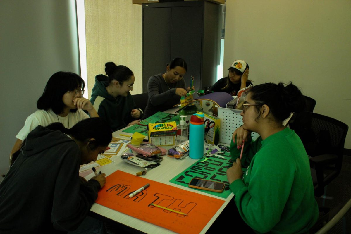 Women in the STEM club planning their Halloween event on Oct 29. (Photo by Abigail Harless)