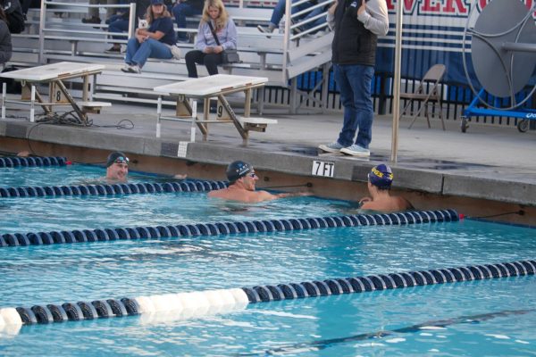 Alumni gather in their lanes in preparation for the upcoming heat on Feb. 21 (Photo by Ly Clark)